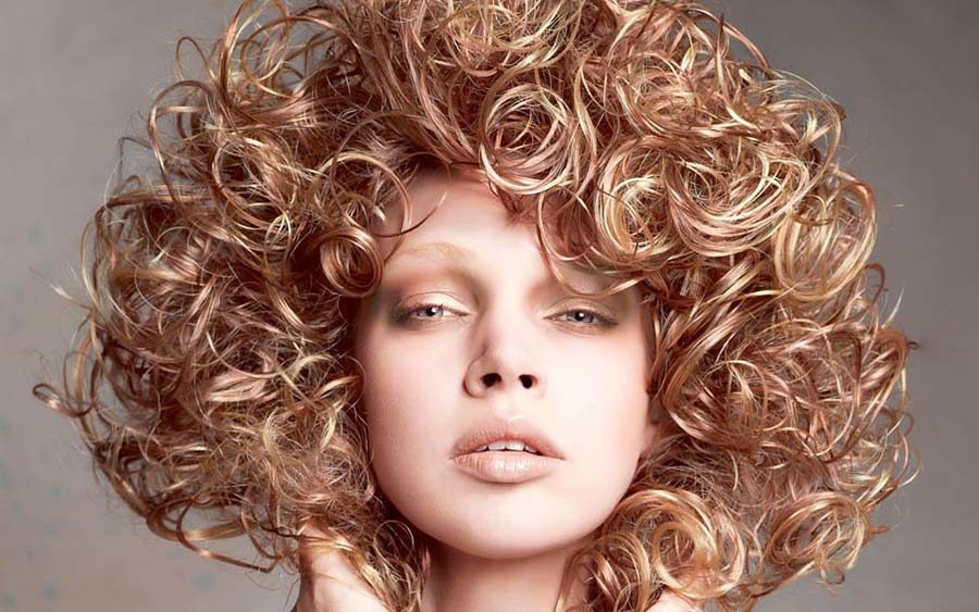 Caramel curls hairstyle at Salon Rami Roumieh